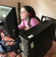 Farnborough school pupil enjoying home larning through a donated computer Farnborough school pupil enjoying home larning through a donated computer