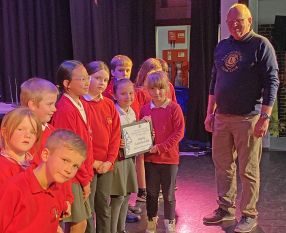 Cherrywood School Choir receieving their prize winning certificate from Lion President Steve Boast Cherrywood School Choir receieving their prize winning certificate from Lion President Steve Boast