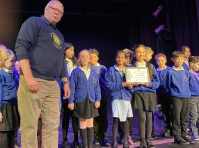 Grange School being presented their certificate by Lion President Steve Boast Grange School being presented their certificate by Lion President Steve Boast