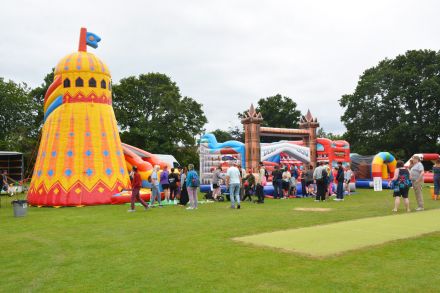 Some of the inflateables set up for fun at Yateley for people with disabilities Some of the inflateables set up for fun at Yateley for people with disabilities