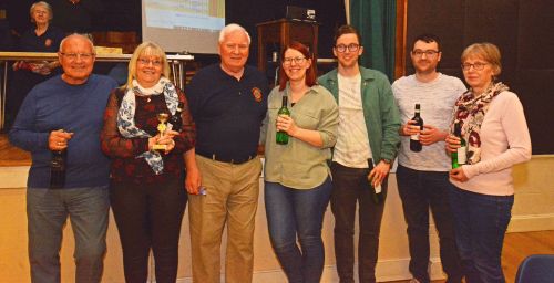 Quiz Night winners 'Area 51' being presented with their prizes by Quizmaker Ray Bentley