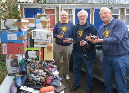 Farnborough Lions sort and pack thousands of recycled spectacles for the third world
